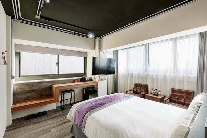 Imagen de la habitación del Hotel SATURN HOTEL. Foto 19
