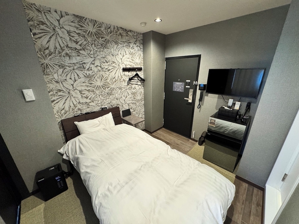 Imagen de la habitación del Hotel SAUNA HOTEL GIFU. Foto 2