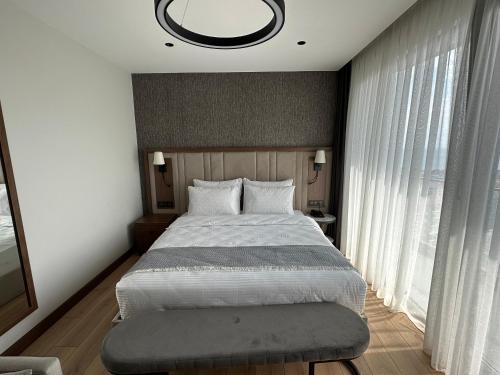 Imagen de la habitación del Hotel SEATOWN RESIDENCE, &Ccedil;ınarlı. Foto 9