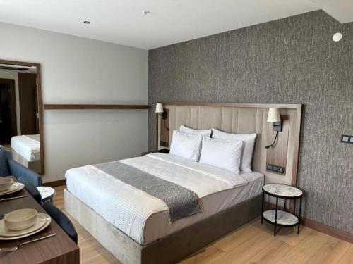 Imagen de la habitación del Hotel SEATOWN RESIDENCE, &Ccedil;ınarlı. Foto 12