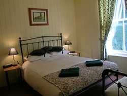 Imagen de la habitación del Hotel SENNEN HOUSE. Foto 3