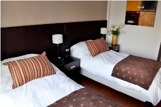 Imagen de la habitación del Hotel SF SUITES. Foto 3