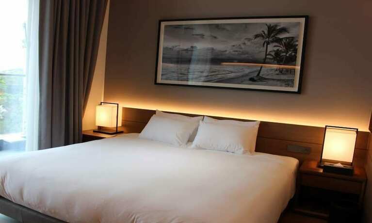 Imagen de la habitación del Hotel SG VILLA. Foto 13