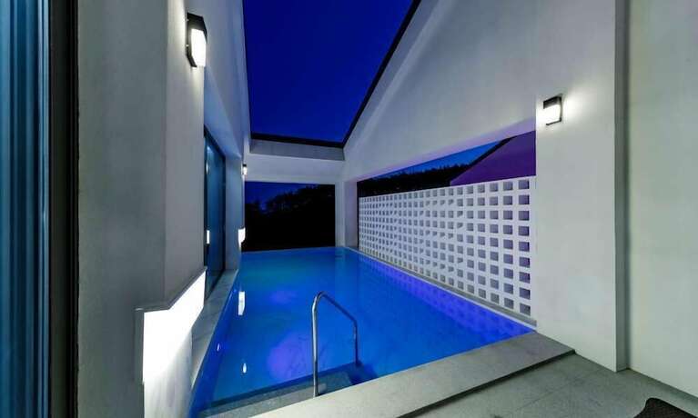 Imagen de la habitación del Hotel SG VILLA. Foto 15