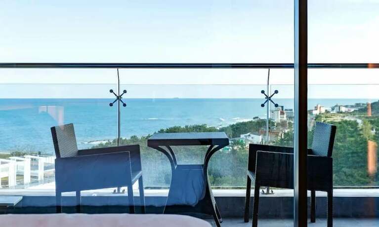 Imagen de la habitación del Hotel SG VILLA. Foto 16