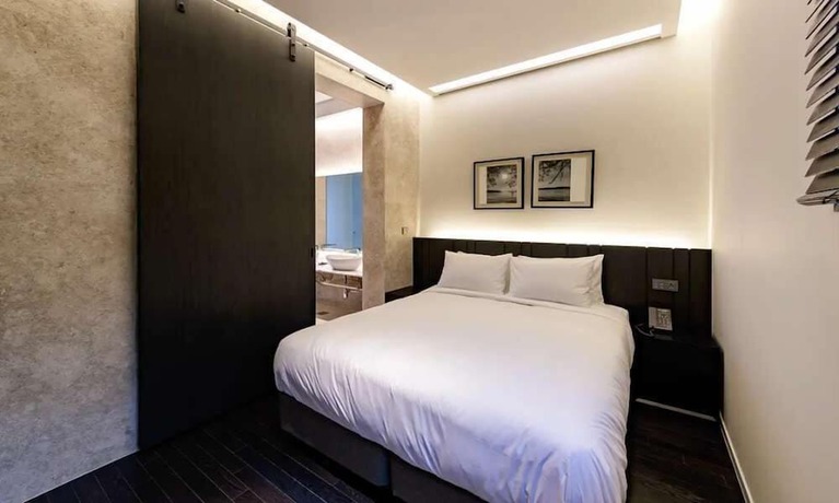 Imagen de la habitación del Hotel SG VILLA. Foto 17