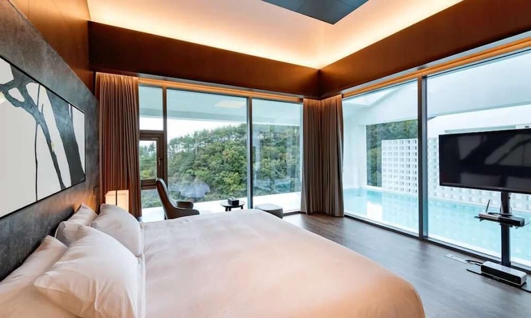 Imagen de la habitación del Hotel SG VILLA. Foto 18