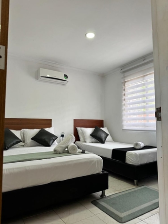 Imagen de la habitación del Hotel SGH MADELEINE INN. Foto 4