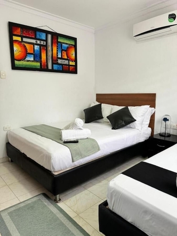 Imagen de la habitación del Hotel SGH MADELEINE INN. Foto 10