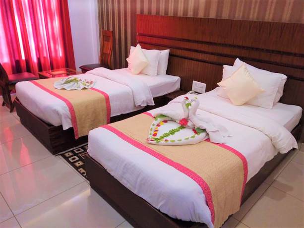 Imagen de la habitación del Hotel SGT Plaza, Varanasi. Foto 2