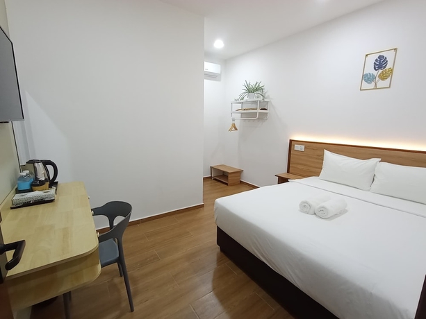 Imagen de la habitación del Hotel SH GARDEN HOTEL. Foto 8