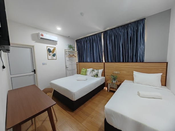 Imagen de la habitación del Hotel SH GARDEN HOTEL. Foto 9