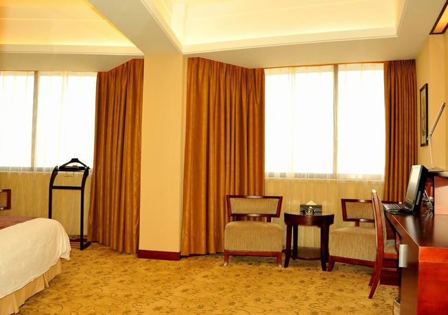 Imagen de la habitación del Hotel SHENZHEN GUEST HOUSE. Foto 2