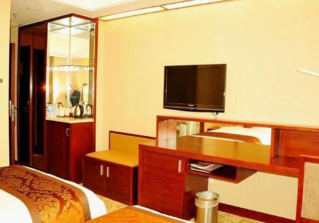 Imagen de la habitación del Hotel SHENZHEN GUEST HOUSE. Foto 9