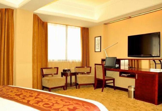 Imagen de la habitación del Hotel SHENZHEN GUEST HOUSE. Foto 11