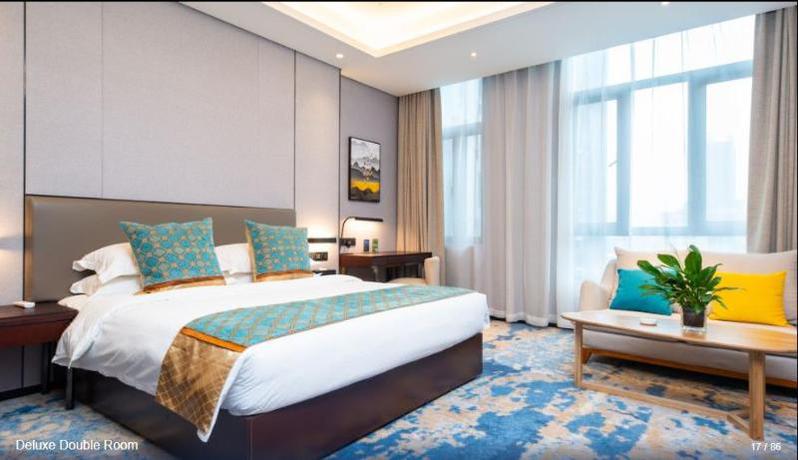 Imagen de la habitación del Hotel SHITING ZHOUJI HOTEL. Foto 9