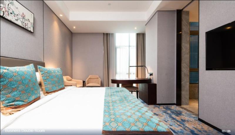 Imagen de la habitación del Hotel SHITING ZHOUJI HOTEL. Foto 10