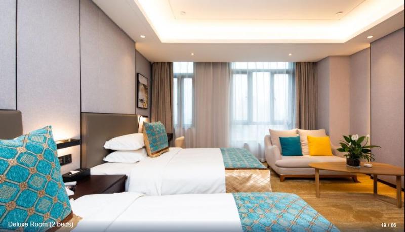 Imagen de la habitación del Hotel SHITING ZHOUJI HOTEL. Foto 11