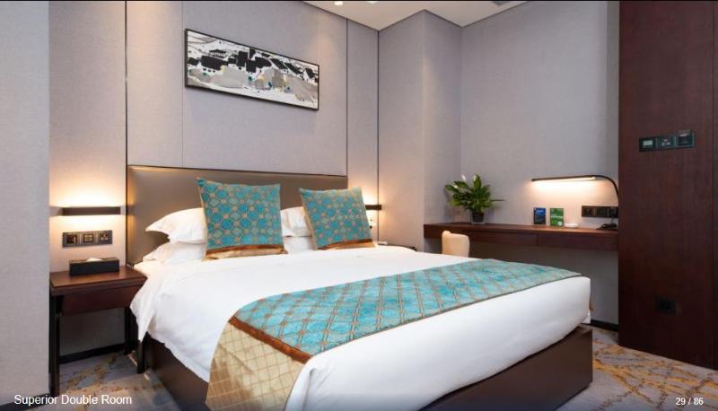 Imagen de la habitación del Hotel SHITING ZHOUJI HOTEL. Foto 12