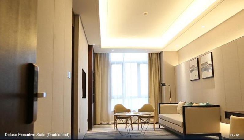 Imagen de la habitación del Hotel SHITING ZHOUJI HOTEL. Foto 16