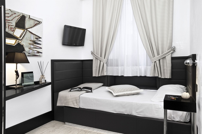 Imagen de la habitación del Hotel SIENA, Roma. Foto 8