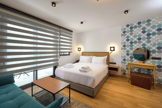 Imagen de la habitación del Hotel SIGMA Suites. Foto 4