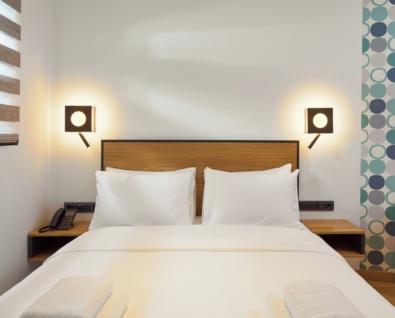 Imagen de la habitación del Hotel SIGMA Suites. Foto 5