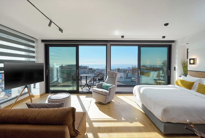 Imagen de la habitación del Hotel SIGMA Suites. Foto 6