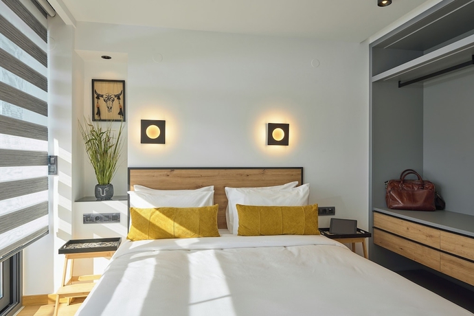 Imagen de la habitación del Hotel SIGMA Suites. Foto 7