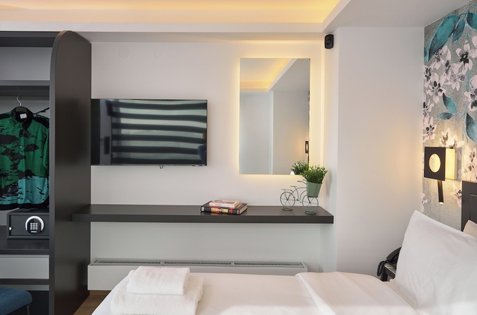 Imagen de la habitación del Hotel SIGMA Suites. Foto 8