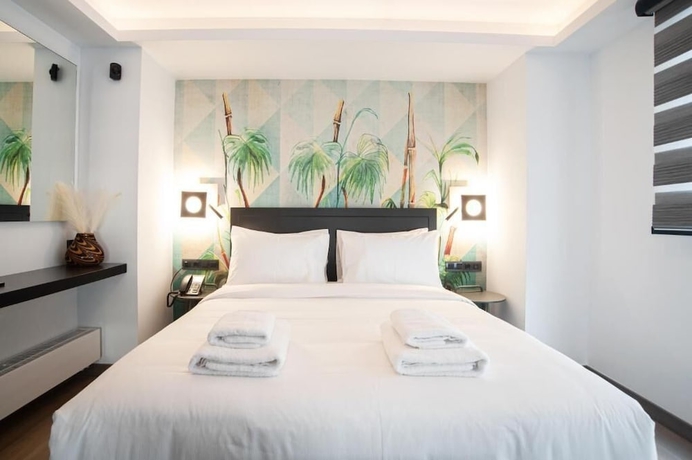 Imagen de la habitación del Hotel SIGMA Suites. Foto 9