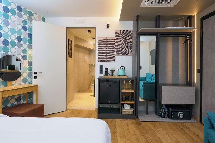 Imagen de la habitación del Hotel SIGMA Suites. Foto 12