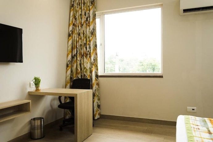 Imagen de la habitación del Hotel SILVER OAK, Gurugram. Foto 7
