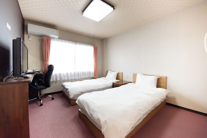 Imagen de la habitación del Hotel SINDAI. Foto 14