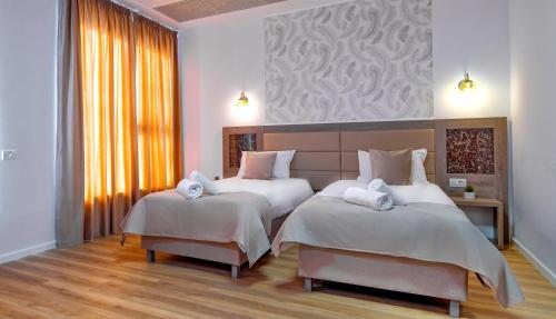 Imagen de la habitación del Hotel SIR FUNDENI HOTEL. Foto 20
