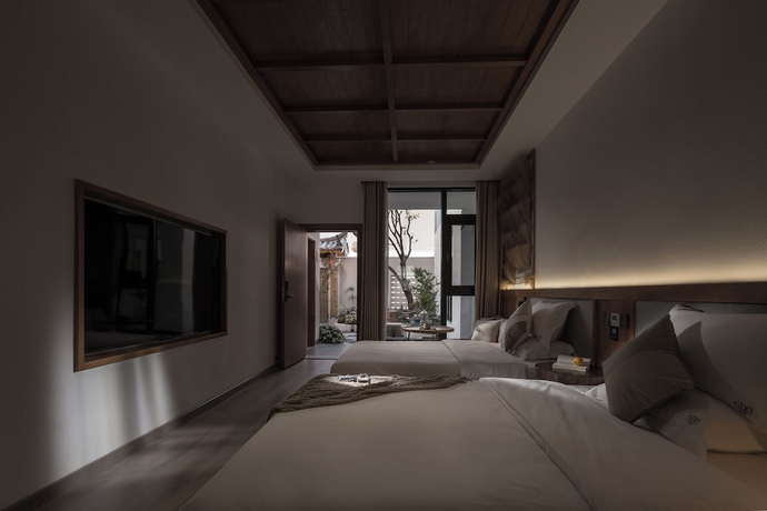 Imagen de la habitación del Hotel SIXI Conglu Design Aesthetics. Foto 15