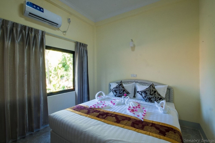 Imagen de la habitación del Hotel SKY Lodge Ngapali. Foto 12