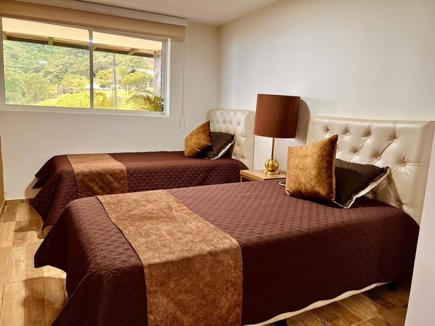 Imagen de la habitación del Hotel SKYGREEN ECOHOTEL. Foto 6