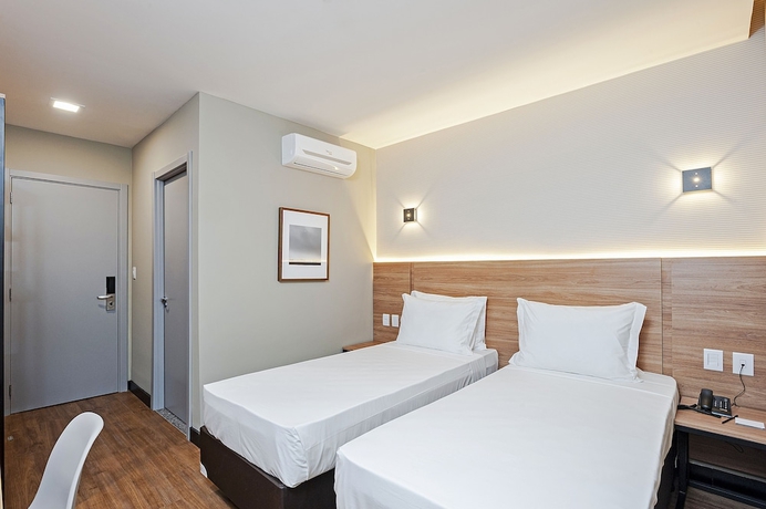 Imagen de la habitación del Hotel SLAVIERO Curitiba Aeroporto. Foto 10