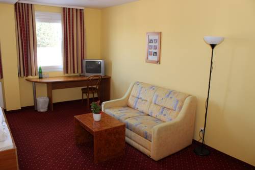 Imagen de la habitación del Hotel SLEEEP Sattledt. Foto 7
