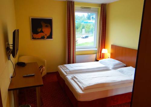 Imagen de la habitación del Hotel SLEEEP Sattledt. Foto 11