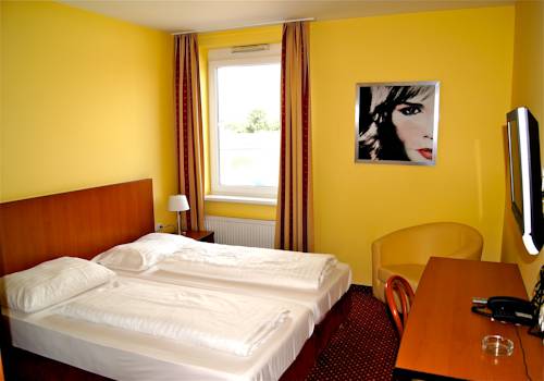 Imagen de la habitación del Hotel SLEEEP Sattledt. Foto 12