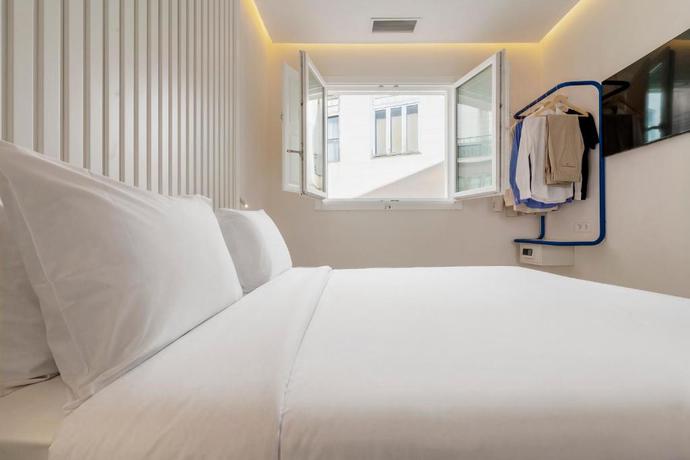 Imagen de la habitación del Hotel SLEEP'N Valencia. Foto 1