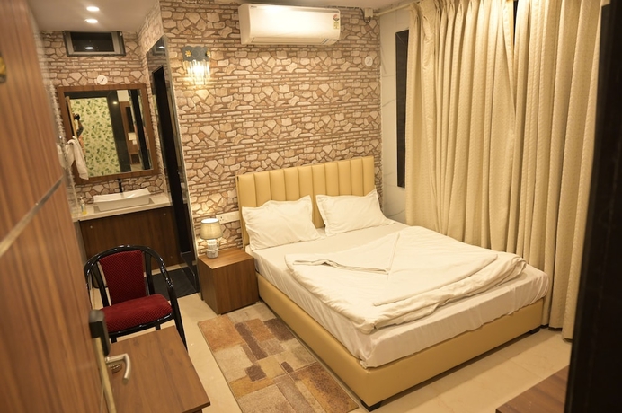Imagen de la habitación del Hotel SLR Grand Haven. Foto 4