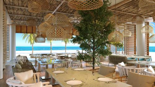 Imagen del bar/restaurante del Hotel SLS Playa Mujeres – ALL Inclusive Collection. Foto 2