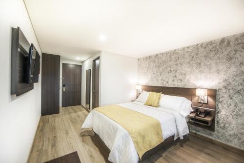 Imagen de la habitación del Hotel SM Grand. Foto 6