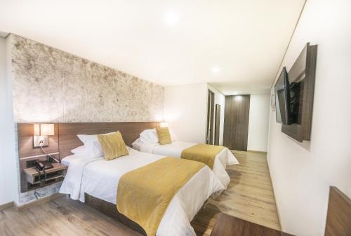 Imagen de la habitación del Hotel SM Grand. Foto 7