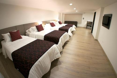 Imagen de la habitación del Hotel SM Grand. Foto 9