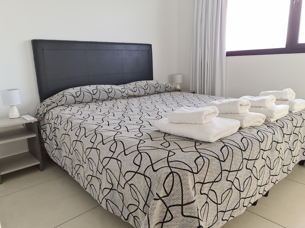 Imagen de la habitación del Hotel SMA Flats. Foto 6
