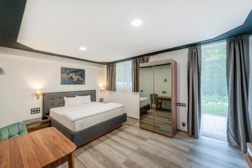 Imagen de la habitación del Hotel SMARTHOTEL Aalen. Foto 18